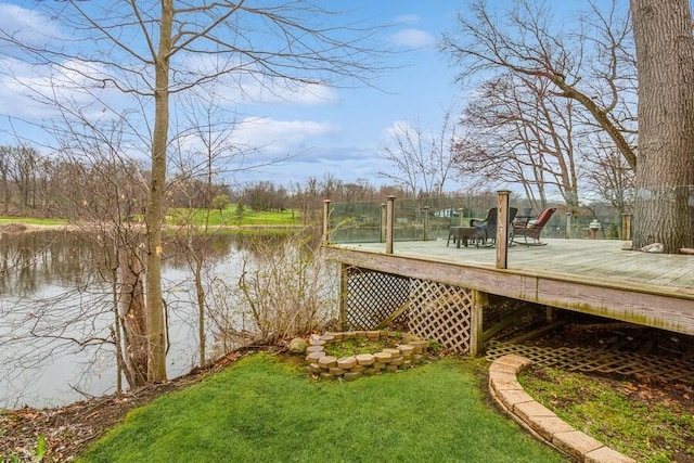 2942 White Oaks Ln, Buchanan, MI 49107 - view of green lawn with a deck with water view