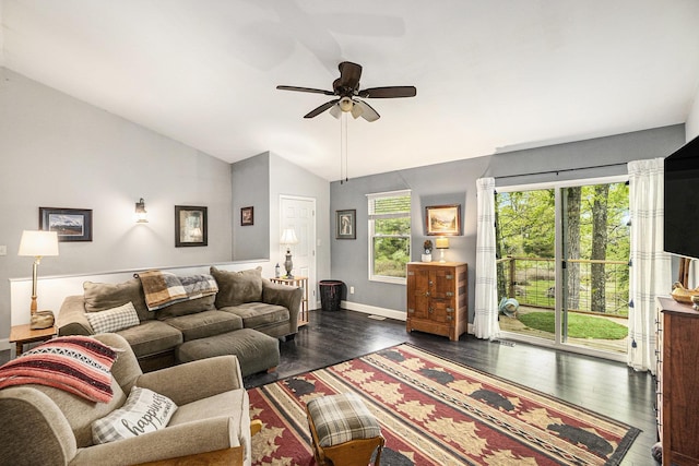 3921 Wildwood Ave, Bitely, MI 49309 - living area featuring lofted ceiling, a ceiling fan, dark wood-style flooring, and baseboards