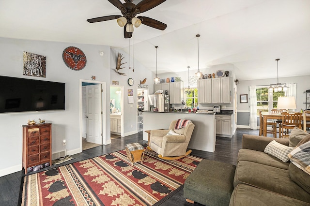 3921 Wildwood Ave, Bitely, MI 49309 - living area with ceiling fan, baseboards, dark wood finished floors, and lofted ceiling