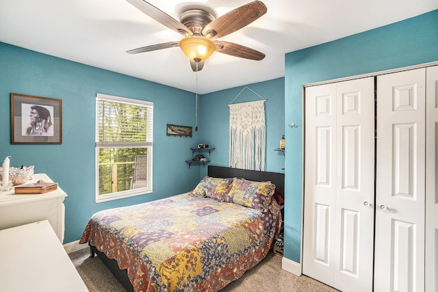 3921 Wildwood Ave, Bitely, MI 49309 - carpeted bedroom with a closet, baseboards, and a ceiling fan