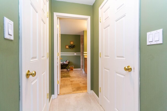 7009 Suncrest Dr, Saline, MI 48176 - corridor featuring baseboards and light colored carpet