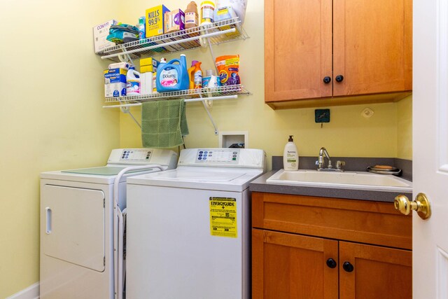 7009 Suncrest Dr, Saline, MI 48176 - laundry room featuring independent washer and dryer and cabinet space
