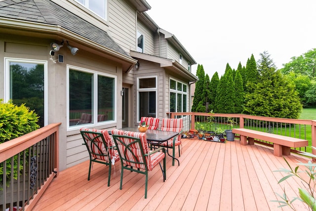 7009 Suncrest Dr, Saline, MI 48176 - wooden deck featuring outdoor dining space