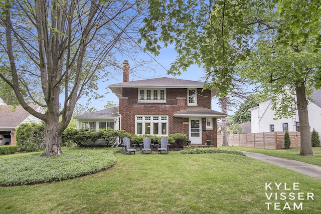 1058 Eastwood Ave SE, East Grand Rapids, MI 49506 - view of front of home featuring a chimney, brick siding, and a shingled roof