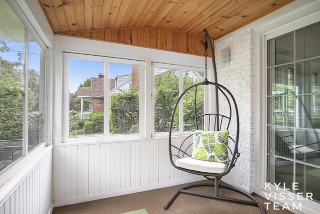 1058 Eastwood Ave SE, East Grand Rapids, MI 49506 - unfurnished sunroom featuring lofted ceiling