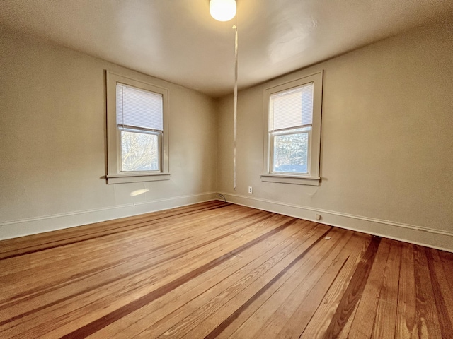 1837 Franklin St, Muskegon, MI 49441 - empty room featuring hardwood / wood-style flooring and baseboards