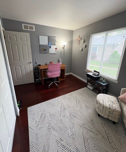 1376 Leisure Dr, Flint, MI 48507 - office area with wood finished floors