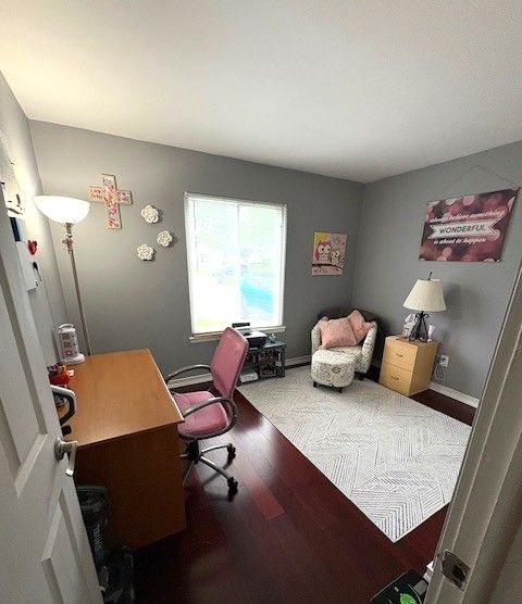 1376 Leisure Dr, Flint, MI 48507 - home office with wood finished floors