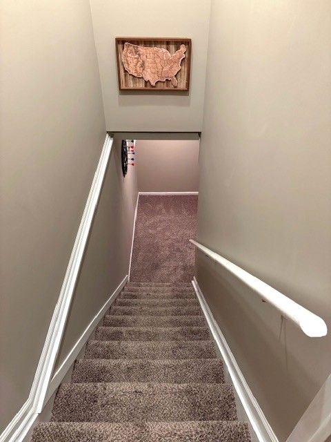 1376 Leisure Dr, Flint, MI 48507 - stairs with carpet floors and baseboards