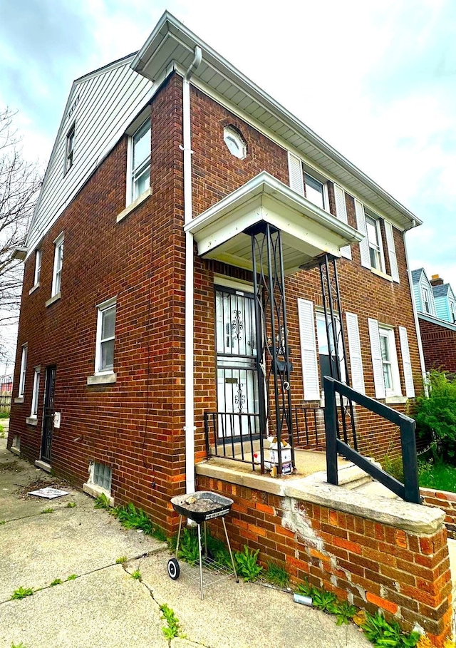 13639 Mecca St, Detroit, MI 48227 - rear view of house featuring brick siding