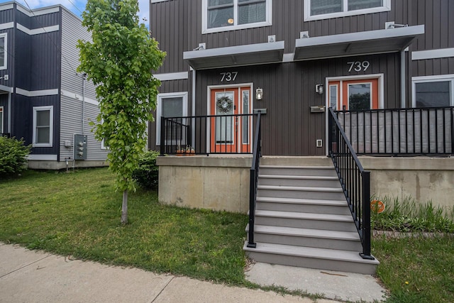 737 Bates St SE, Grand Rapids, MI 49503 - view of exterior entry featuring a lawn