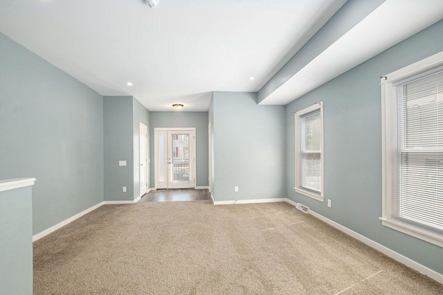737 Bates St SE, Grand Rapids, MI 49503 - empty room featuring light colored carpet and baseboards