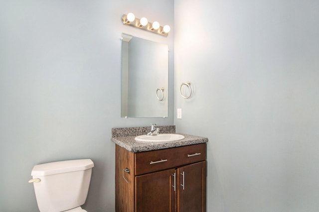 737 Bates St SE, Grand Rapids, MI 49503 - bathroom with vanity and toilet