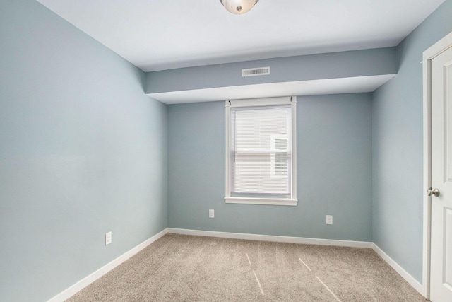 737 Bates St SE, Grand Rapids, MI 49503 - carpeted spare room featuring baseboards