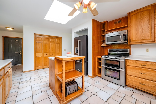 5142 Becht Rd, Coloma, MI 49038 - kitchen with open shelves, stainless steel appliances, and light countertops
