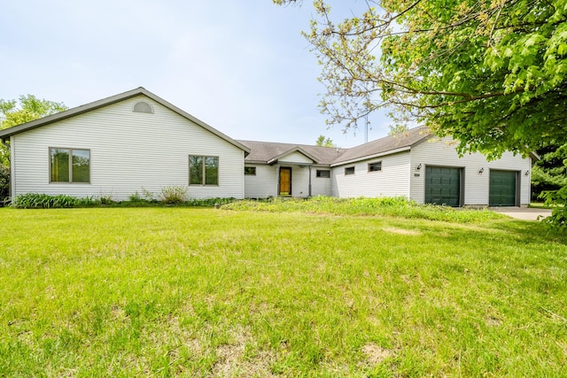 5142 Becht Rd, Coloma, MI 49038 - view of front of house featuring a front yard and an attached garage