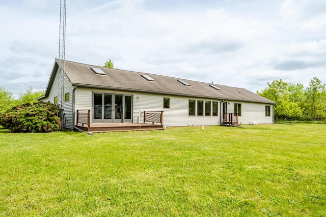 5142 Becht Rd, Coloma, MI 49038 - back of house featuring a lawn and a deck