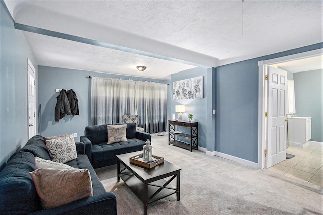1912 E Centre Ave, Portage, MI 49002 - living room with baseboards, carpet, and a textured ceiling