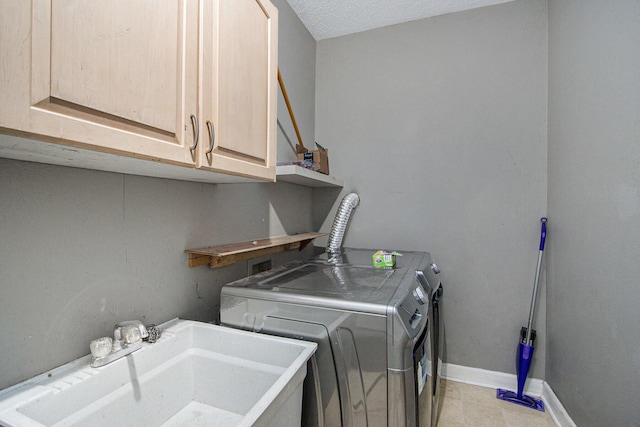 1912 E Centre Ave, Portage, MI 49002 - laundry room with independent washer and dryer, cabinet space, and baseboards