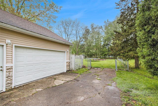 1912 E Centre Ave, Portage, MI 49002 - garage featuring asphalt driveway