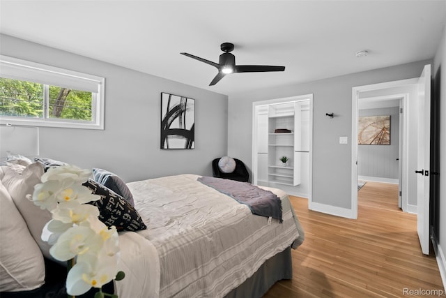 29748 Chelmsford Rd, Southfield, MI 48076 - bedroom with baseboards, light wood-style floors, and a ceiling fan