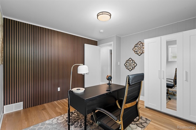 29748 Chelmsford Rd, Southfield, MI 48076 - home office featuring light wood-type flooring and crown molding