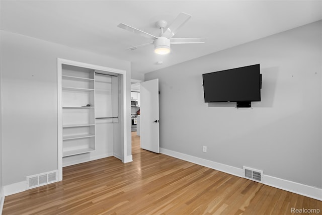 29748 Chelmsford Rd, Southfield, MI 48076 - unfurnished bedroom with baseboards, light wood finished floors, and a closet