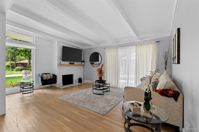 29748 Chelmsford Rd, Southfield, MI 48076 - living room featuring light wood-style flooring and a fireplace