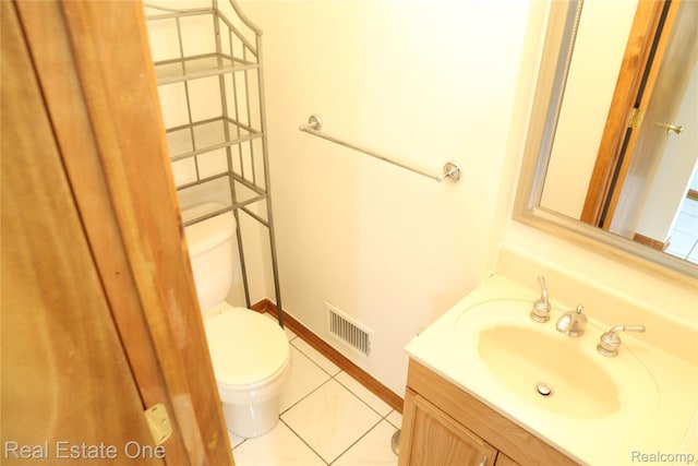 18675 Webster Ave, Southfield, MI 48076 - bathroom featuring toilet, vanity, and tile patterned flooring