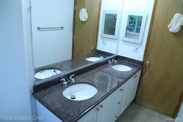 18675 Webster Ave, Southfield, MI 48076 - bathroom with double vanity and tile patterned floors