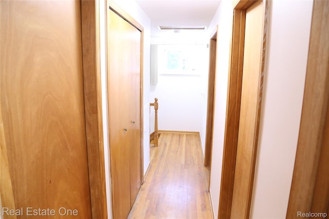 18675 Webster Ave, Southfield, MI 48076 - corridor with light wood-style flooring and an upstairs landing