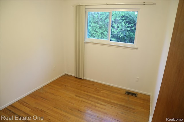 18675 Webster Ave, Southfield, MI 48076 - unfurnished room featuring wood finished floors and baseboards