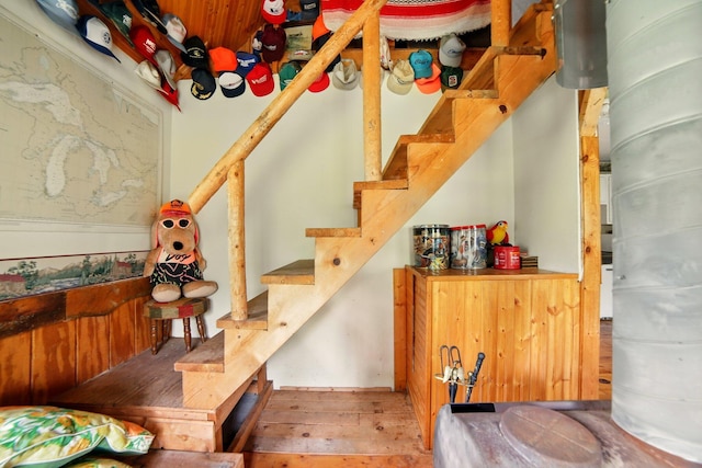 841 W Woodland Park Dr, Bitely, MI 49309 - stairs with wood-type flooring