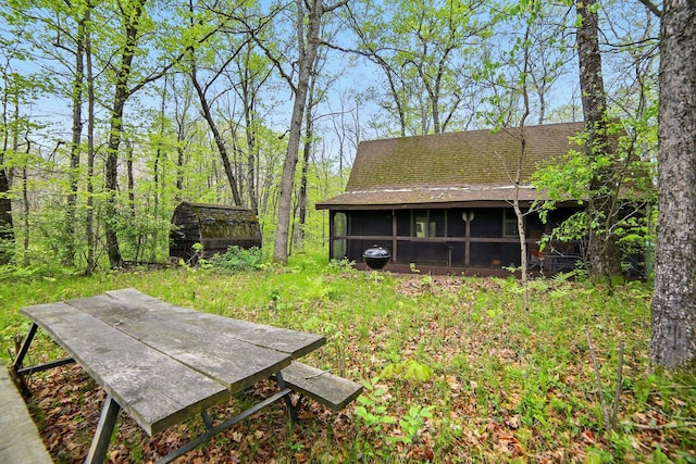 841 W Woodland Park Dr, Bitely, MI 49309 - view of yard featuring a sunroom