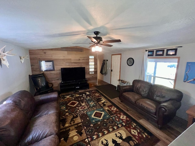 2828 Trepanier Dr Unit 515, Ludington, MI 49431 - living area featuring wooden walls and a ceiling fan