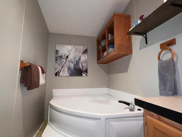 2828 Trepanier Dr Unit 515, Ludington, MI 49431 - full bath featuring a bath and vanity