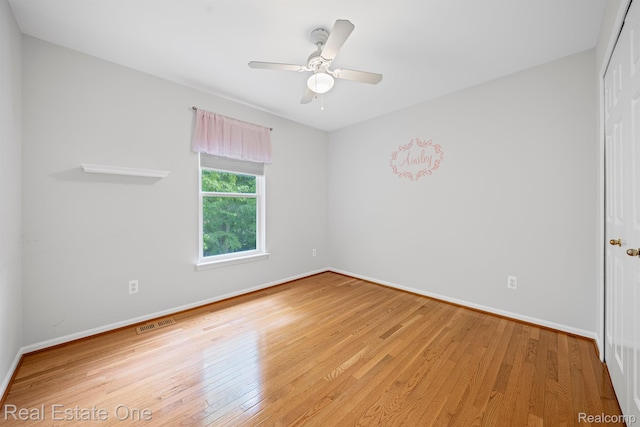 29329 Whistler Dr, Novi, MI 48377 - unfurnished room featuring hardwood / wood-style flooring, baseboards, and a ceiling fan