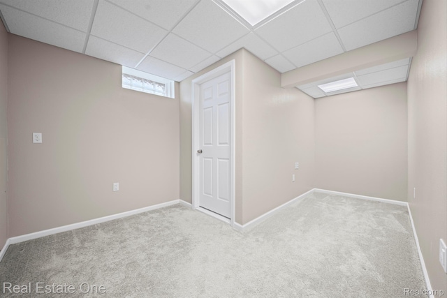 29329 Whistler Dr, Novi, MI 48377 - below grade area featuring carpet, a paneled ceiling, and baseboards