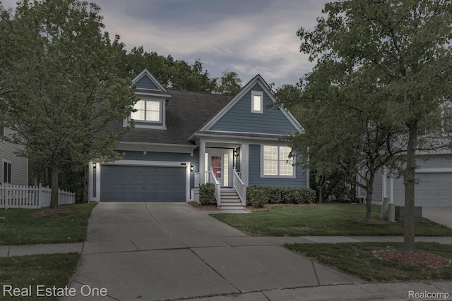 29329 Whistler Dr, Novi, MI 48377 - view of front of home with driveway, an attached garage, and a shingled roof