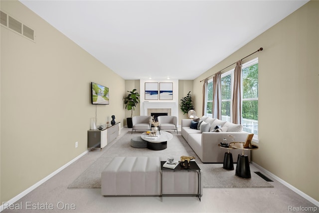 29329 Whistler Dr, Novi, MI 48377 - carpeted living area featuring a fireplace and baseboards