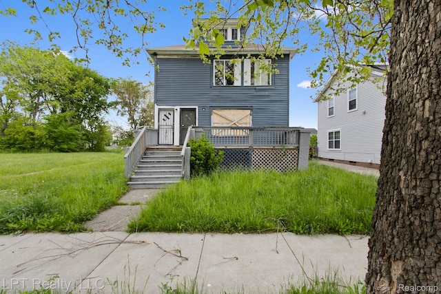 2174 Springle St, Detroit, MI 48215 - view of front facade featuring a deck