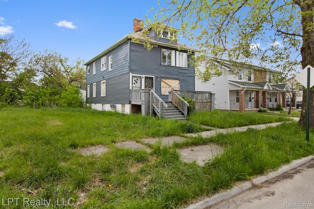 2174 Springle St, Detroit, MI 48215 - view of front facade with a chimney