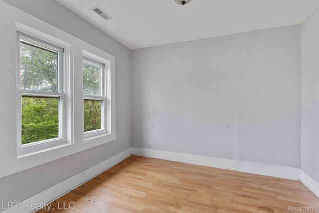 2174 Springle St, Detroit, MI 48215 - empty room featuring light wood-type flooring and baseboards