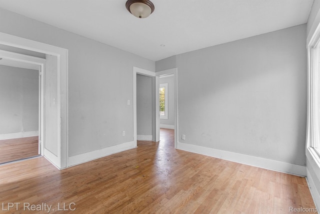 2174 Springle St, Detroit, MI 48215 - empty room with baseboards and wood finished floors