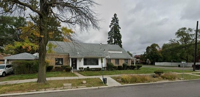 5960 W Outer Dr, Detroit, MI 48235 - ranch-style home with a front lawn