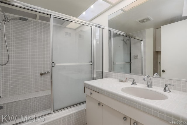 7273 Creeks Bend Ct, West Bloomfield, MI 48322 - full bath with tiled shower and vanity