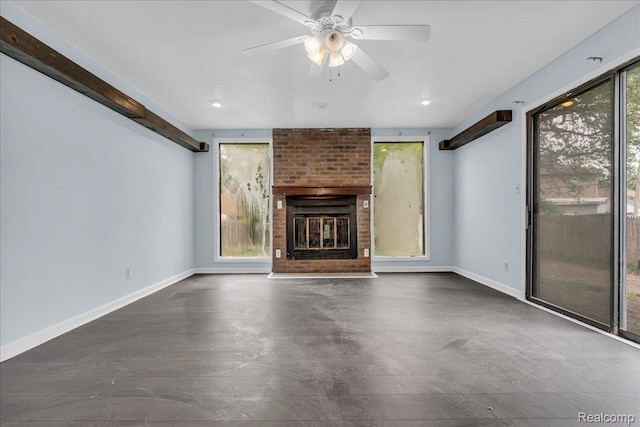 14004 Abington Ave, Detroit, MI 48227 - unfurnished living room featuring baseboards, ceiling fan, a brick fireplace, and recessed lighting