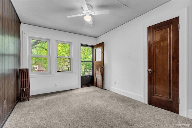 14004 Abington Ave, Detroit, MI 48227 - empty room featuring light carpet, baseboards, and ceiling fan