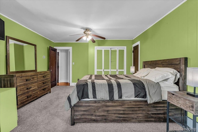 14004 Abington Ave, Detroit, MI 48227 - bedroom featuring ornamental molding, a closet, carpet, and ceiling fan