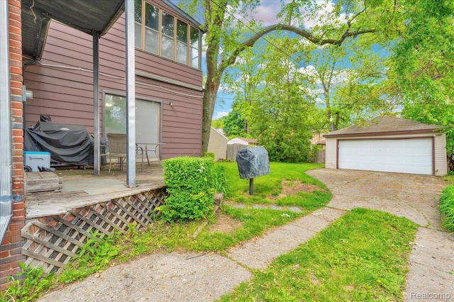 14004 Abington Ave, Detroit, MI 48227 - view of yard featuring a garage and an outdoor structure